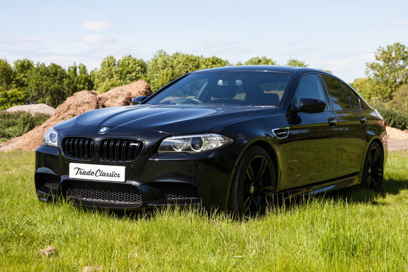 https://www.tradeclassics.com/wp-content/uploads/2019/08/2015-BMW-M5-F10-Featured-1.jpg